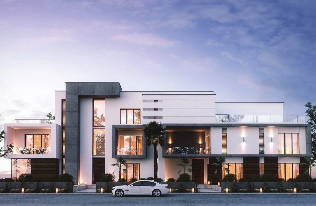 Luxury stone-clad villa at dusk